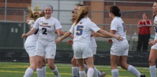 female football player sits out for her team mates